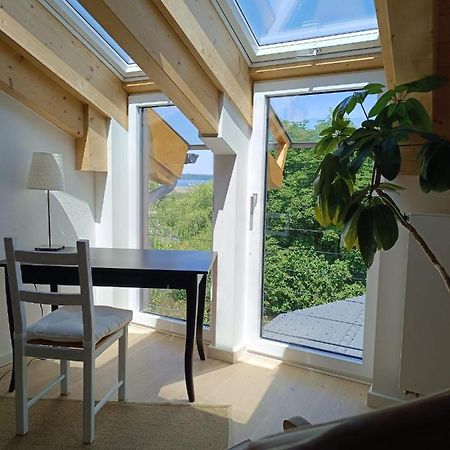 Apartment Unterm Dach Mit Kleinem Seeblick Мюнзинг Экстерьер фото